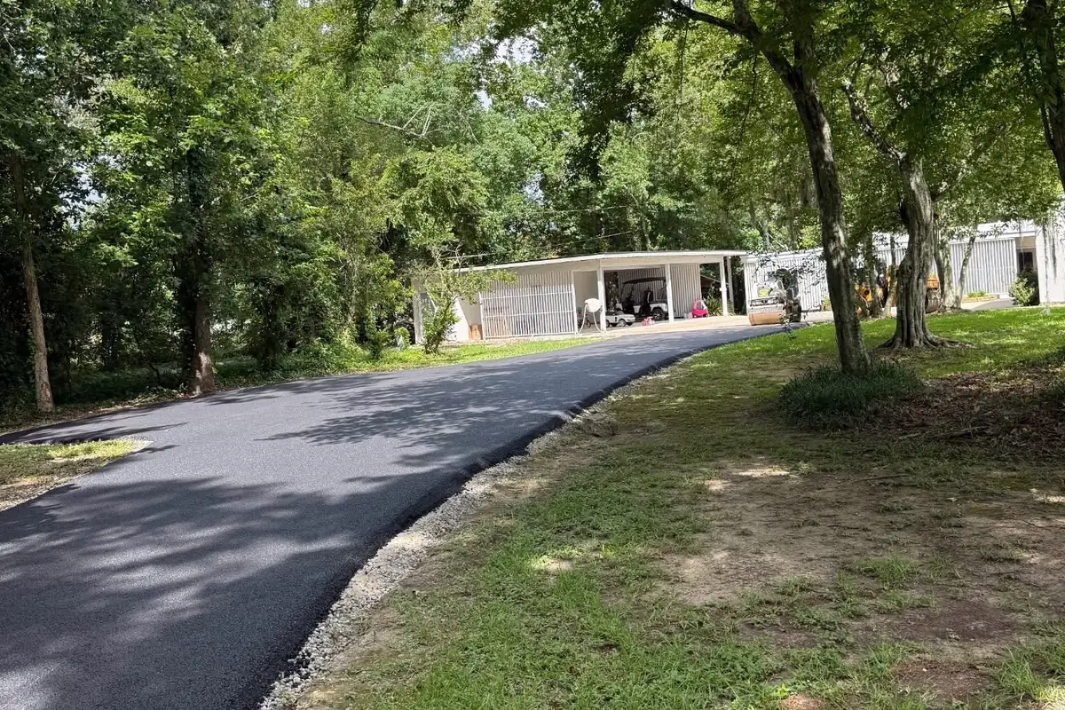 Residential Asphalt Driveway in Southeast Louisiana - Chris Paving LLC New asphalt driveway at a residential property in southeast louisiana
